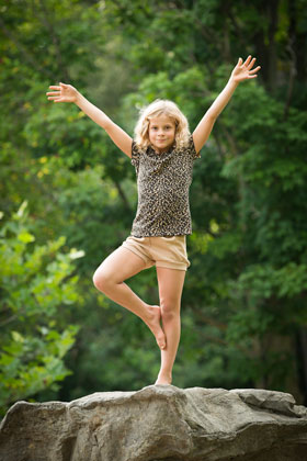 girl doing tree pose